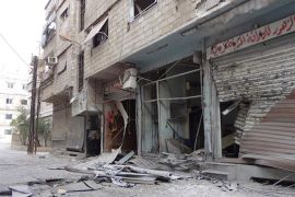 جانب من الدمار الذي خلفه القصف المدفعي والصاروخي من قبل قوات النظام على الأبنية السكنية في بلدة المليحة .