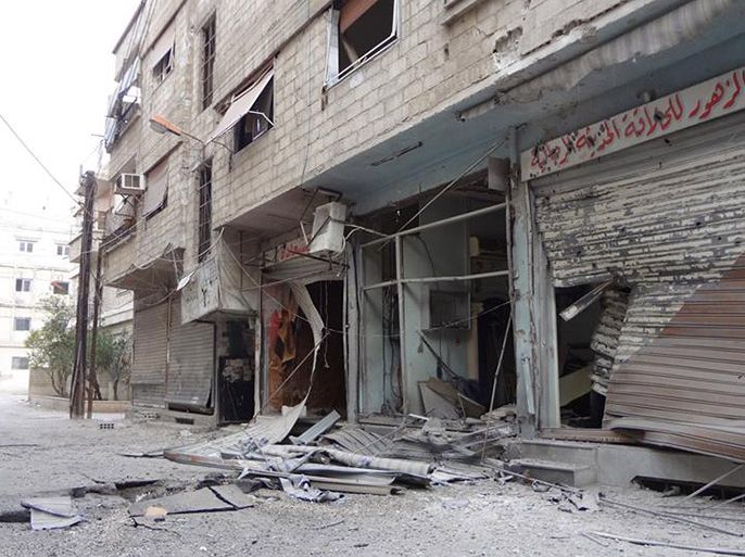 جانب من الدمار الذي خلفه القصف المدفعي والصاروخي من قبل قوات النظام على الأبنية السكنية في بلدة المليحة .