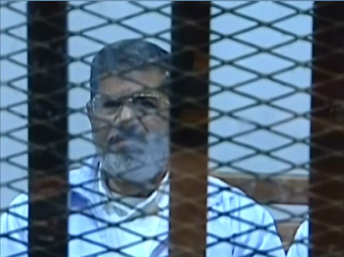 صور لمحاكمة مرسي