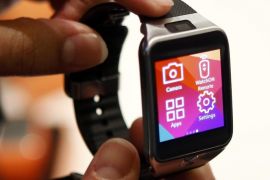 New Samsung Gear 2 smartwatch is displayed at the Mobile World Congress in Barcelona February 23, 2014. REUTERS/Albert Gea