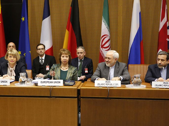 568 - Vienna, -, AUSTRIA : Catherine Margaret Ashton (2ndL), Vice President of the European Commission, Javad Mohammad Zarif (2ndR), Iranian Foreign Minister and Hassan Tajik (R), Iranian ambassador to Austria attend the EU 5+1 Talks with Iran at the UN headquarters in Vienna, Austria on February 18, 2014. Nuclear talks between Iran and world powers moved to the next level Tuesday, February 18, 2014 as negotiators began work on transforming an interim deal into an ambitious lasting accord. AFP PHOTO/DIETER NAGL