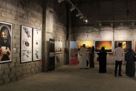 MN3052 - Jeddah, -, SAUDI ARABIA : People attend an art event gathering young and established poets and artists in Jeddah, Saudi Arabia, on February 03, 2014. AFP PHOTO/STR