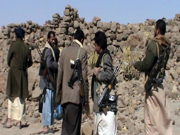 مسلحون من قبائل حاشد في محافظة عمران حيث دارت معارك مع الحوثيين (الفرنسية)