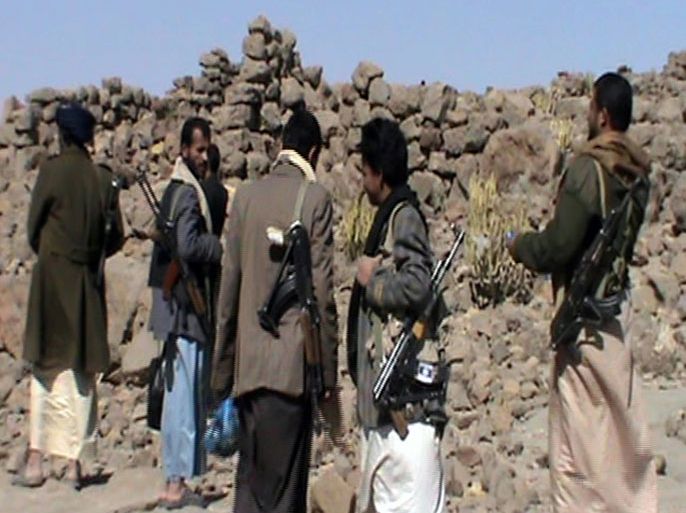 A picture taken by a mobile phone shows militants of al-Ahmar tribe somewhere at Omran province north of Yemen on February 2, 2014. Shiite Huthi rebels have overrun strongholds of powerful tribes in northern Yemen, witnesses said, in a major advance following a month of combat that has left scores dead. AFP PHOTO/STR