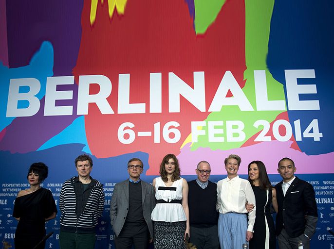 Berlin, Berlin, GERMANY : The jury of the 64rdBerlinale film festival (L to R) Iranian director Mitra Farahani, French director Michel Gondry, Austrian actor Christoph Waltz, US actress Greta Gerwig,US producer and president of the jury James Schamus, Danish actress Trine Dyrholm, US producer Barbara Broccoli and Chinese actor Tony Leung pose for photographers during a photocall in Berlin February 6, 2013. The 64rd Berlinale, the first major European film festival of the year, starts on February 6, 2013 with 24 international productions screening in the main showcase. AFP PHOTO / JOHANNES EISELE