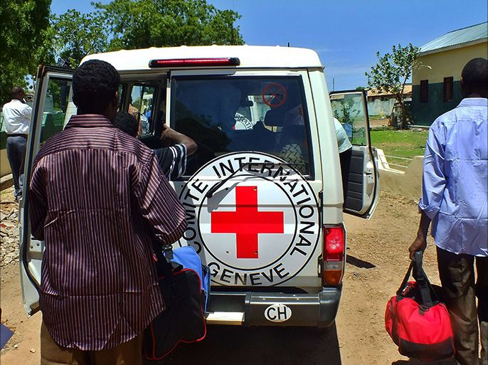A picture taken on April 25, 2012 shows Sudanese prisoners of war boarding International Committee of the Red Cross (ICRC) vehicles following their release in South Sudan's capital Juba