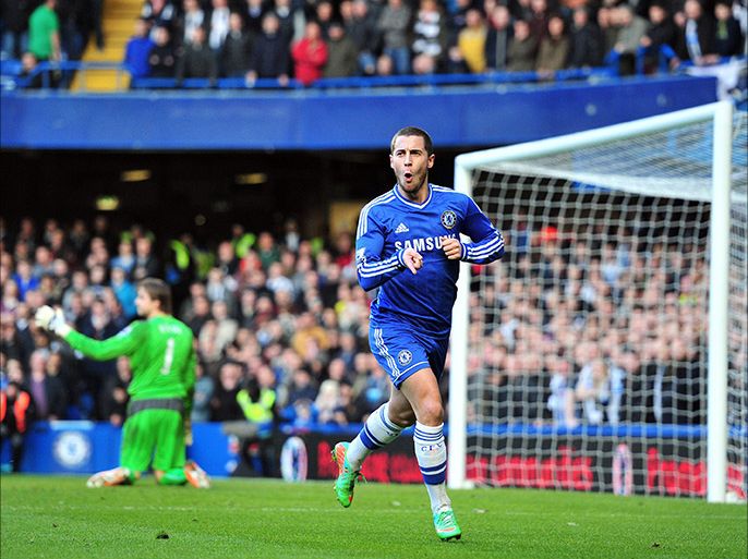 Chelsea's Belgian midfielder Eden Hazard celebrates scoring the opening goal during the English Premier League football match between Chelsea and Newcastle United at Stamford Bridge in west London on February 8, 2014. AFP PHOTO / GLYN KIRK
