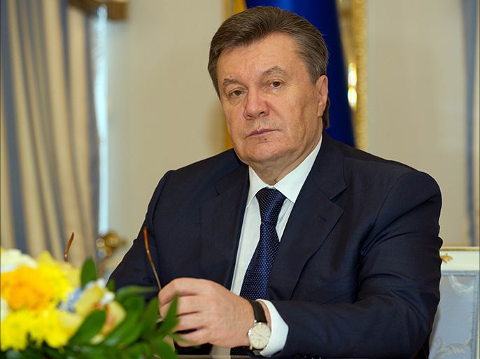 epa04102155 (FILE) A file photo dated 21 February 2014 showing Ukrainian president Viktor Yanukovych looking on after signing an agreement at the Presidential Palace in Kiev, Ukraine on a way out of the country's political crisis. Media reports on 27 February 2014 state deposed Ukrainian president Viktor Yanukovych has asked for Russia's protection,