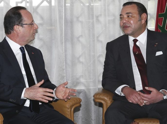French President Francois Hollande (L) and Morocco's King Mohammed VI (R) pose prior to a meeting at the king's Palace in Casablanca on April 3, 2013. Hollande arrived in Morocco fresh from battling an explosive tax fraud scandal that risks overshadowing his landmark two-day visit to the former French colony.