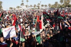 Demonstrators take part in a protest against the General National Congress (GNC) at the Martyrs' Square in Tripoli February 7, 2014. . REUTERS/Ismail Zitouny (LIBYA - Tags: POLITICS CIVIL UNREST)