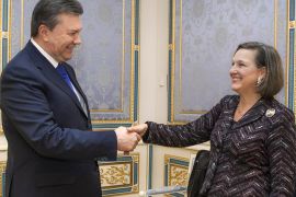 Ukraine's President Viktor Yanukovych, left, greets U.S. Assistant Secretary for European and Eurasian Affairs Victoria Nuland in Kiev, Ukraine, Thursday, Feb. 6, 2014. The senior U.S. diplomat has arrived in the Ukrainian capital to try to help find a resolution to the protests and political crisis that have gripped the country for more than two months. Nuland is on a two day visit to Kiev. (AP Photo / Mykhailo Markiv, Pool)
