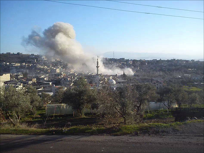قوات النظام تواصل قصف حمص وريفها بالبراميل المتفجرة (الجزيرة نت)