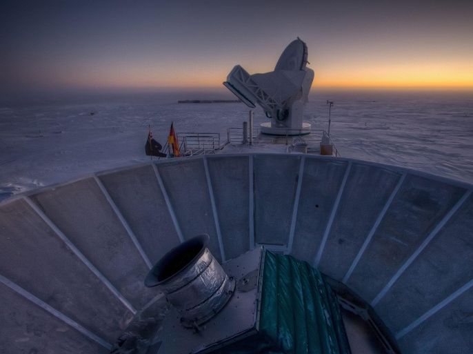 A handout made available by Harvard University shows the sun setting behind BICEP2 (in the foreground) and the South Pole Telescope (in the background) in Antarctica, 31 March 2007. Researchers from the BICEP2 collaboration announced at Harvard University the first direct evidence of a cosmic inflation that initiated the 'Big Bang' nearly 14 billion years ago which is believed to have formed our universe. EPA/STEFFEN RICHTER / HARVARD UNIVERSITY / HANDOUT