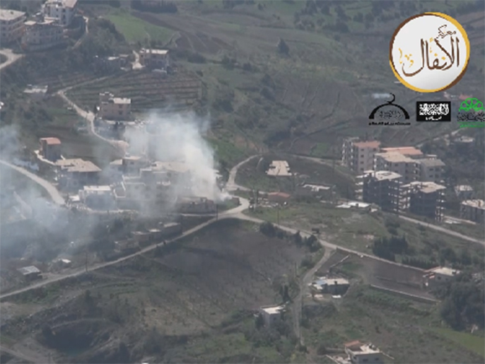 صورة بثها ناشطون لاستهداف الجيش الحر مركز قوات النظام ببلدة كسب بريف اللاذقية