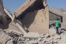 الدمار في مدينة البوكمال جراء الغارات الجوية