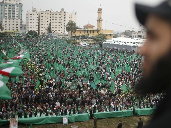Supporters listen as Ismail Haniyeh, prime minister of the Hamas Gaza government, speaks during a Hamas rally marking the anniversary of the death of its leaders killed by Israel, in Gaza City March 23, 2014. REUTERS/Mohammed Salem (GAZA - Tags: POLITICS CIVIL UNREST ANNIVERSARY)