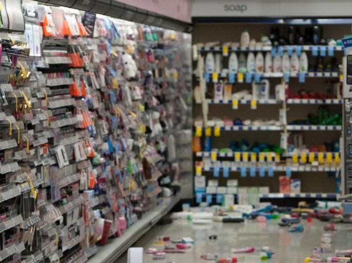 Merchandise is strewn across the floor in a La Habra Walgreens following a 5.1 earthquake centered near La Habra Friday night March 28, 2014. (AP Photo/The Orange County Register, Blaine, Ohigashi)