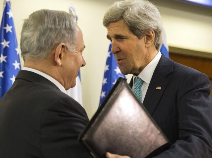 U.S. Secretary of State John Kerry, right, meets with Israeli Prime Minister Benjamin Netanyahu in Jerusalem, Monday March 31, 2014, for a previously unannounced stop in Israel to continue working on talks about the Middle East peace process. (AP Photo/Jacquelyn Martin, Pool)