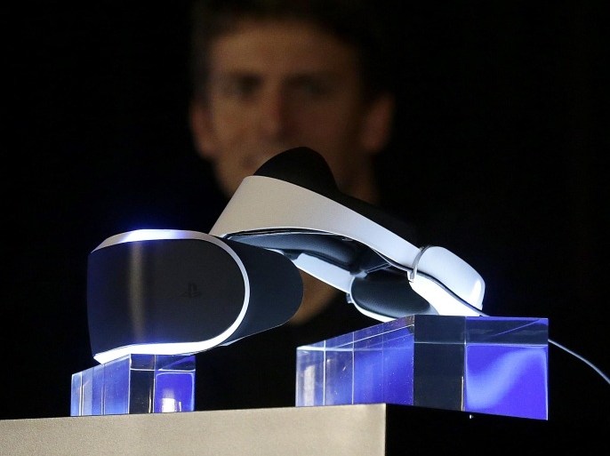 The PlayStation 4 virtual reality headset Project Morpheus is shown on stage as Richard Marks, senior director of research and development at Sony Computer Entertainment America, answers questions at the Game Developers Conference 2014 in San Francisco, Tuesday, March 18, 2014. (AP Photo/Jeff Chiu)