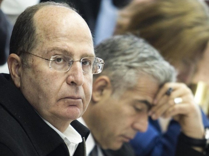 Israel's Defense Minister Moshe Yaalon listens during the weekly cabinet meeting at his office in Jerusalem, Israel, Sunday, March 23, 2014. (AP Photo/Abir Sultan, Pool)