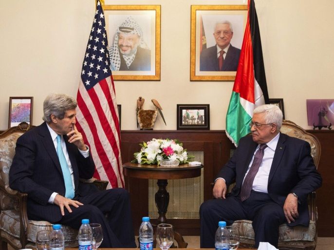 U.S. Secretary of State John Kerry (L), meets with Palestinian President Mahmoud Abbas, at the Palestinian Ambassador�s Residence in Amman, Jordan March 26, 2014, in an effort to salvage the Middle East peace talks as a breakdown looms. REUTERS/Jacquelyn Martin/Pool (JORDAN - Tags: POLITICS)