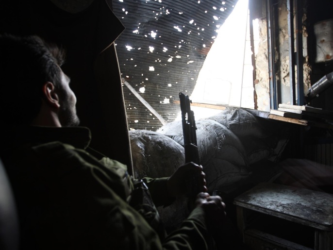 قوات المعارضة المسلحة سيطرت اليوم على عدة حواجز بإدلب(غيتي إيميجز)