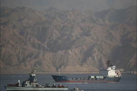 An Israeli Navy boat escorts the Panamanian-flagged cargo vessel Klos C into the Israeli port of Eilat on Saturday after seizing it in the Red Sea on Wednesday, March 8, 2014. Israel said the Klos C was carrying dozens of advanced Iranian-supplied weapons made in Syria and intended for Palestinian