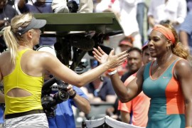 Maria Sharapova, of Russia, left, congratulates Serena Williams at the Sony Open tennis tournament in Key Biscayne, Fla., Thursday, March 27, 2014. Willaims won 6-4, 6-3. (AP Photo/Alan Diaz)