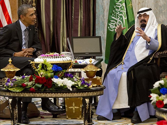 US President Barack Obama (L) meets with Saudi King Abdullah (R) at Rawdat Khurayim, the monarch's desert camp 60 miles (35 miles) northeast of Riyadh, on March 28, 2014. Obama arrived in Riyadh for talks with Saudi King Abdullah as mistrust fuelled by differences over Iran and Syria overshadows a decades-long alliance between their countries. AFP PHOTO / SAUL LOEB