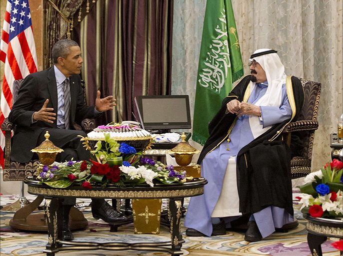 US President Barack Obama (C-L) meets with Saudi King Abdullah (C-R) at Rawdat Khurayim, the monarch's desert camp 60 miles (35 miles) northeast of Riyadh, on March 28, 2014. Obama arrived in Riyadh for talks with Saudi King Abdullah as mistrust fuelled by differences over Iran and Syria overshadows a decades-long alliance between their countries. AFP PHOTO / SAUL LOEB