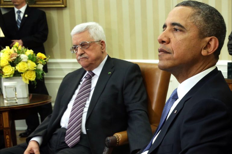 epa04129968 US President Barack Obama (R) meets with Palestinian President Mahmoud Abbas (L) in the Oval Office of the White House in Washington, DC, USA, 17 March 2014.