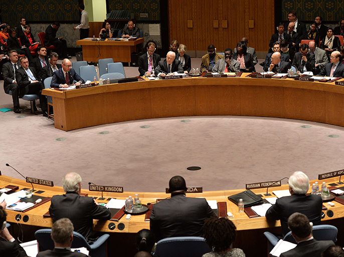 Ukraine interim Prime Minister Arsenit Yatsenyukat (top row) speaks at a meeting of the United Nations Security Council to discuss the situation in Ukraine March 13, 2014 at UN headquarters in New York. AFP
