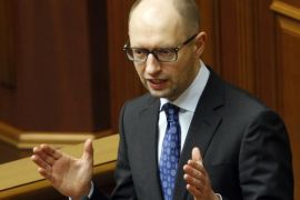 Ukraine's interim Prime Minister Arseniy Yatsenyuk gives a speech at the Ukrainian Parliament during a session in Kiev on March 11, 2014. AFP PHOTO/ YURY KIRNICHNY