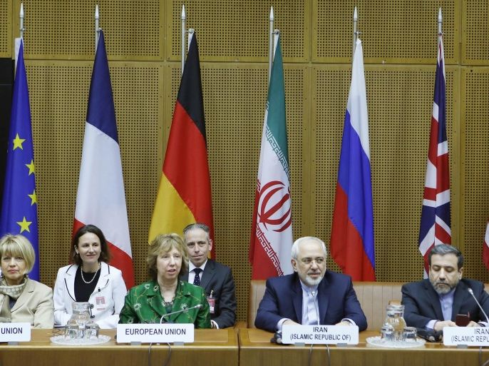 (LtoR) EU Deputy Secretary General Helga Schmid, Vice President of the European Commission Catherine Margaret Ashton, Iranian Foreign Minister Javad Mohammad Zarif, and Iranian ambassador to Austria Hassan Tajik attend the socalled EU 5+1 Talks with Iran at the UN headquarters in Vienna, on April 8, 2014.Iran and world powers hold a third round of nuclear talks aimed at securing a highly ambitious lasting agreement by July, as they seek to end a decade-old standoff over the Iranian nuclear programme. AFP PHOTO/DIETER NAGL