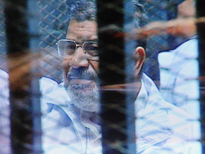 النيابة وجهت لمرسي تهم تحريض أنصاره ومساعديه على ارتكاب جرائم القتل(أسوشيتد برس-أرشيف)