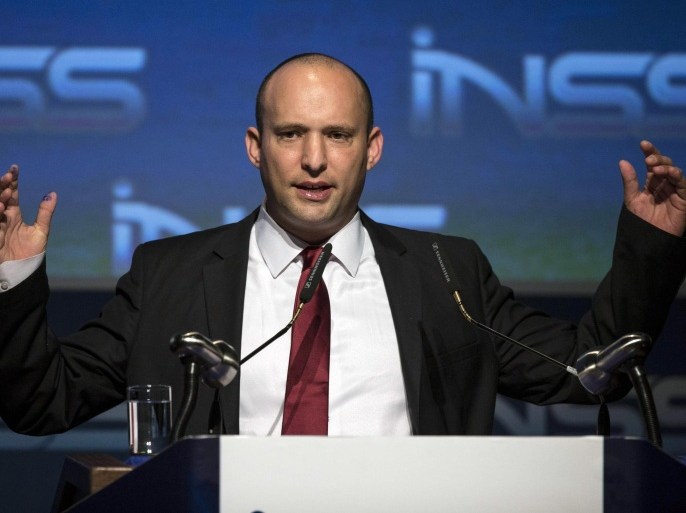 Israeli Economics and Trade Minister Naftali Bennett, leader of the Jewish Home party, gives a speech at the Institute for National Security Studies (INSS) during the 7th Annual International Conference at the Tel Aviv Museum of Art on January 28, 2014, in the Mediterranean coastal city of Tel-Aviv. The event runs until January 29. AFP PHOTO / JACK GUEZ