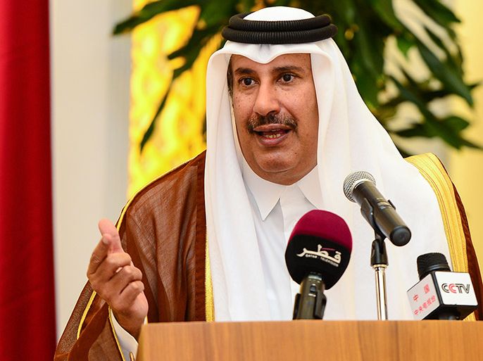 epa03656488 Qatari Prime Minister Sheikh Hamad bin Jassim al-Thani speaks during a press conference with Egyptian Prime Minister Hisham Qandil (not pictured) at the Emiri Diwan in Doha, Qatar, 10 April 2013. According to media sources, Qatar on 10 April agreed to allocate three billion dollars to buy Egyptian bonds to help the Egyptian economy. EPA/STRINGER