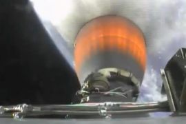 This Friday, April 18, 2014 image made from video shows the engine of the second stage of the rocket carrying the SpaceX Dragon capsule. The Dragon cargo ship is scheduled to reach the orbiting lab on Sunday, April 20, 2014 - Easter morning. (AP Photo/NASA)