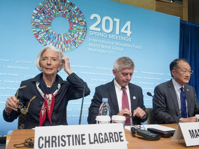 International Monetary Fund (IMF) Managing Director Christine Lagarde (L), Chairman of the Development Committee of the World Bank and IMF, Marek Belka (C), and World Bank President Jim Yong Kim (R), hold a news conference at the IMF in Washington DC, USA, 12 April 2014. The IMF World Bank 2014 Spring Meetings run through 13 April 2014.