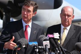 PERTH, AUSTRALIA - APRIL 08: Air Chief Marshal Angus Houston (Ret'd) and Defence Minister David Johnston address the media during a press conference over the continuing search for missing Malaysia Airlines Flight MH370 at RAAF Base Pearce on April 8, 2014 in Perth, Australia. ACM Angus Houston advised the towed pinger by ADV Ocean Shield is still trying to re-locate the signals previously detected, which were believed to be consistent with aircraft black boxes. The airliner disappeared on March 8 with 239 passengers and crew on board and is suspected to have crashed into the southern Indian Ocean.