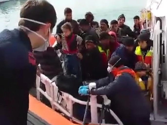A handout video grabbed image made available by the Italian Coast Guard on 09 April 2014 shows the arrival in the port of Pozzallo (Sicily) of migrants rescued in the Strait of Sicily. The Italian authorities have rescued around 4,000 migrants over the past 48 hours, Italian Interior Minister Angelino Alfano said early on 09 April. The minister added that at least one person had been found dead aboard one of the multitude of rescued boats. Late 08 April 2014, Alfano organized a meeting with police, Navy and coast guard officials participating in the rescue-and-surveillance Mare Nostrum operation to deal with the emergency caused by a upswing in mass migrant arrivals in recent days. EPA/ITALIAN COAST GUARD PRESS OFFICE HANDOUT