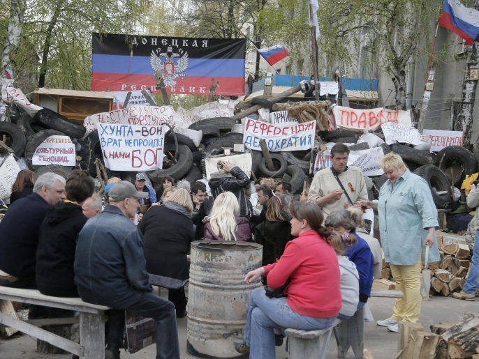 ‪‬ المحتجون الموالون لروسيا في شرقي أوكرانيا أعلنوا تحديهم لاتفاق جنيف(أسوشيتد برس)