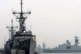 A handout picture provided by the Military News Agency of Taiwan shows Taiwan Navy's La Fayette-class frigate Cheng De prepare to keave Tsoying Naval Base in Kaohsiung, southern Taiwan, 13 March 2014, to join in the search for the missing Malaysia Airlines plane over the South China Sea. Malaysia Airlines flight MH370 with 239 people on board went missing early 08 March 2014 while on its way from Kuala Lumpur to Beijing, China. Taiwan has sent three coast guard patrol ships to join the in the search and will dispatch another frigate to join in the search on 14 March. EPA/MILITARY NEWS AGENCY