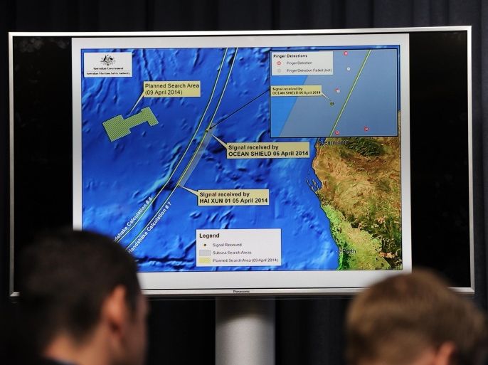 A graphic of the area being searched for missing Malaysia Airlines flight MH370, is displayed during a media conference involving Angus Houston, head of the Joint Agency Coordination Centre in Perth on April 9, 2014. Australian ship Ocean Shield detected two more signals on April 8 to match a pair of transmissions picked up earlier in the week that have been analysed as consistent with flight data recorder emissions, Houston said. AFP PHOTO / POOL / Greg WOOD