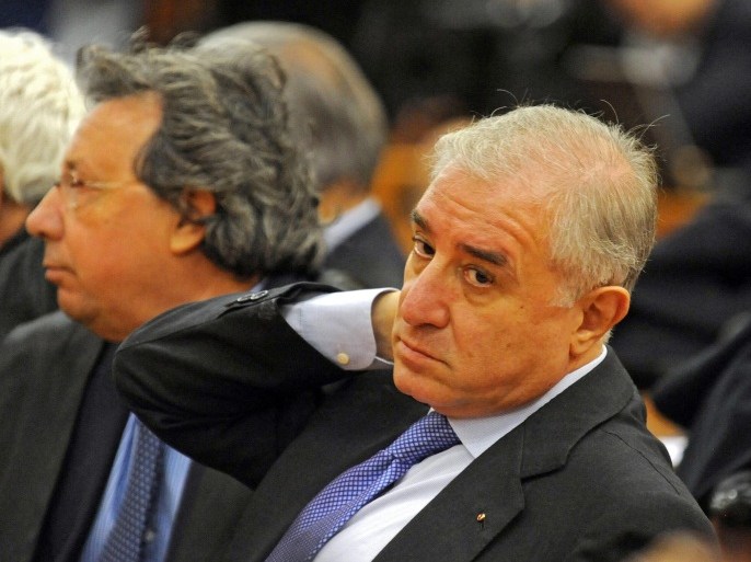 (FILE) A file picture dated 04 December 2009 shows then Italian Senator Marcello Dell'Utri (C) attending his appeals trial at the Palace of Justice in Turin, Italy. Dell'Utri, a long-time associate of former Italian premier Berlusconi, has left the country days before a court is due to deliver a final verdict on his presumed links to the Sicilian mafia, reports said 11 April 2014. He was jailed for seven years for consorting with mobsters in a provisional appeal ruling. Police tried to arrest him this week, but failed to find him at his Milan home. He is also a defendant in an ongoing high-profile trial in Palermo over a secret non-aggression pact that senior politicians, police officers and mafia bosses are alleged to have sealed in the early 1990s to stop a deadly Cosa Nostra bombing campaign. EPA/TONINO DI MARCO *** Local Caption *** 01954668