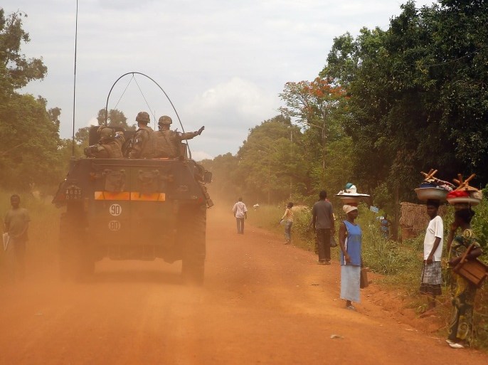 French forces patrol in Sibut, some 200kms (140 miles) northeast of Bangui, Central African Republic, Friday April 11, 2014. The U.N. Security Council voted unanimously Thursday to authorize a nearly 12,000-strong U.N. peacekeeping force for Central African Republic, but won't arrive until September. (AP Photo/Jerome Delay)