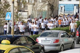 عداؤون من مختلف أنحاء شاركوا في ماراثون فلسطين الدولي الثاني بمدينة بيت لحم. 11إبريل/نيسان 2014 (تصوير عوض الرجوب-الجزيرة نت).