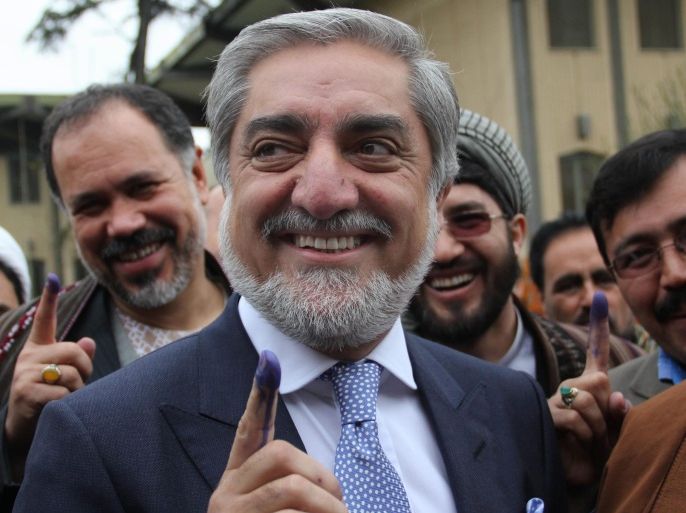 Afghan presidential candidate Dr. Abdullah Abdullah shows his finger marked with indelible ink after casting his ballot at a polling station during the presidential elections in Kabul, Afghanistan, 05 April 2014. Afghanistan began voting 05 April, for a new president amid fears of violence and insecurity. About 12 million voters are eligible to cast ballots at some 6,400 polling centers across the country, according to IEC. Around 400,000 security forces have been deployed.