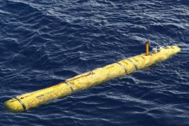 A handout picture released by the Australian Defence Department on 17 April 2014 shows the Phoenix Autonomous Underwater Vehicle (AUV) Bluefin-21 as it is floating in the water after it was craned over the side of Australian Defence Vessel Ocean Shield in the search for missing Malaysia Airlines flight MH 370, in the Indian Ocean on 16 April 2014. No trace of Malaysia Airlines flight MH370 was found by the underwater drone sent to the bottom of the Indian Ocean in an area where the Boeing 777 was believed to have crashed. EPA/LSIS Bradley Darvill / Australian Defence Department