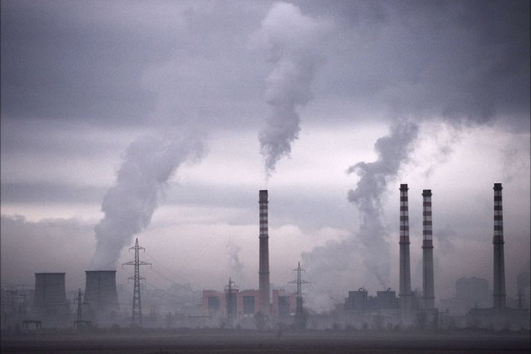 (FILES) This file picture dated on February 14, 2013 shows smoke rising from stacks of a thermal power station in Sofia. Soaring carbon emissions will amplify the risk of conflict, hunger, floods and mass migration this century, the UN's expert panel said on March 31, 2014 in a landmark report